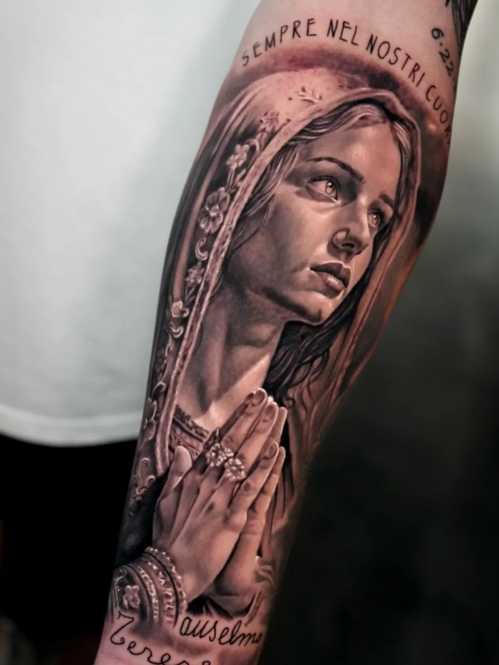 Praying Madonna black and grey realism portrait tattoo